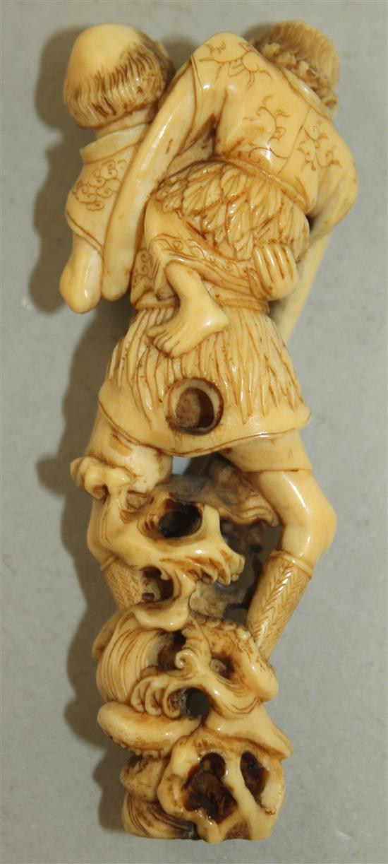 A Japanese ivory okimono of Ashinaga and Tenaga, Meiji period, 6.8cm